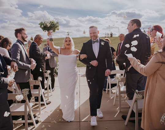Outdoor couple wedding ceremony